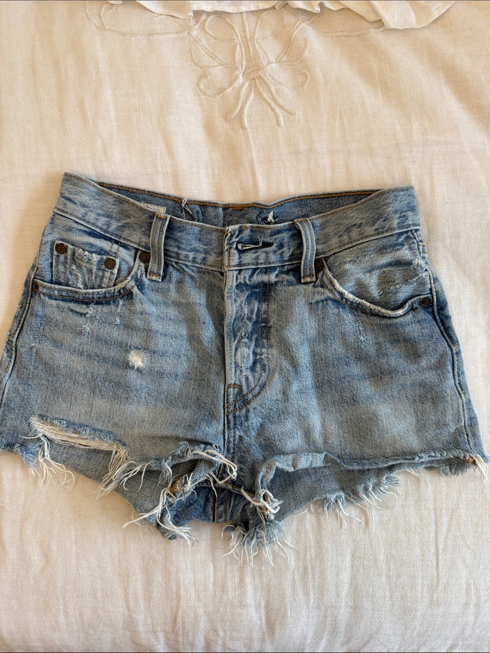LEVI’S 501 Frayed Hem Light Blue Denim Shorts